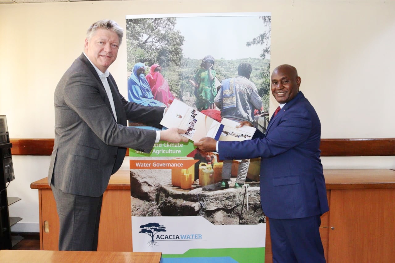 Representative from Acacia Water, Dr. Victor Langenberg (Left) exchange signed MoU with the VC, Prof. Benedict Mutua