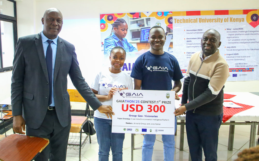 Winners of the GAIAthon '25 received a cash award of USD 300 from DVC Research and Development Prof. Isaac Orina (L) and Director, Centre for Innovation and Technology Transfer, Prof. Levi Mbugua (R)