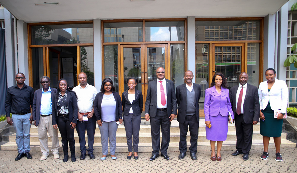 Guests from Pharmacy & Poisons Board who were leb by Prof. David Nyamu in a group picture with Senior Members of staff after re-inspection exercise of Pharmaceutical training at TU-K 