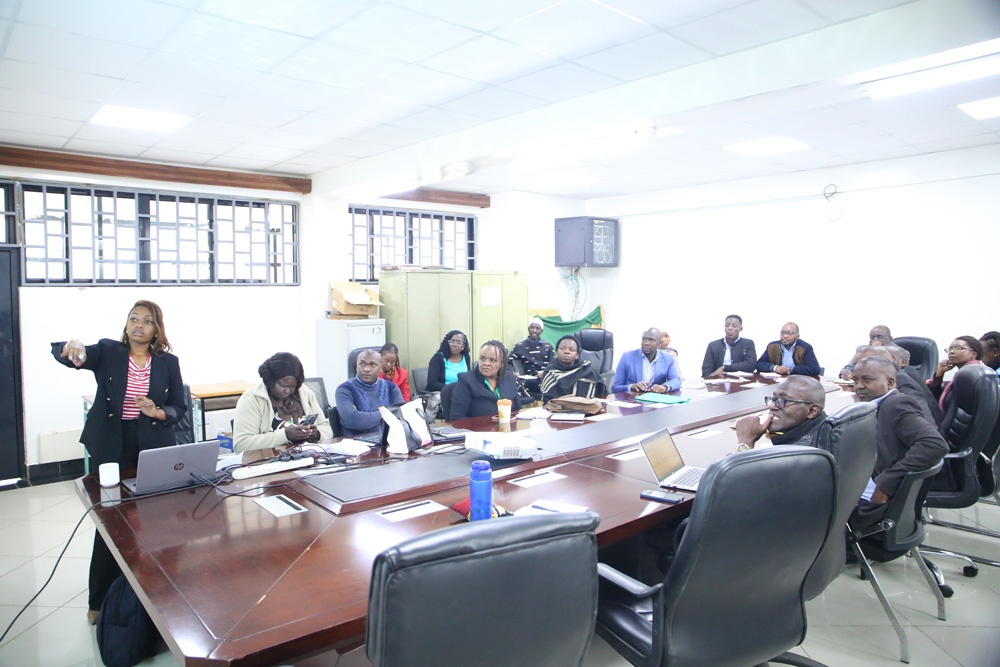  Catherine Mwaura, a trainer from the National Productivity and Competitiveness Centre (NPCC), delivers a presentation to the Members of the Productivity Mainstreaming Committee.