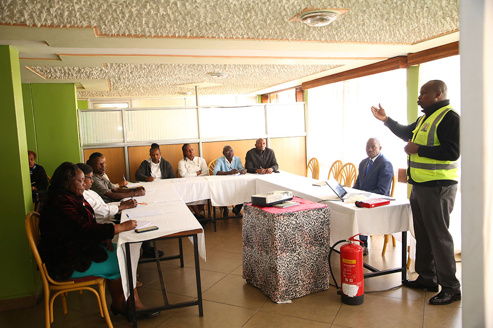 Mr. Wickliffe Sungu, University Safety Technician from the Department of Property and Facilities Management, guides trainees through an insightful session on disaster fire management during the safety training.