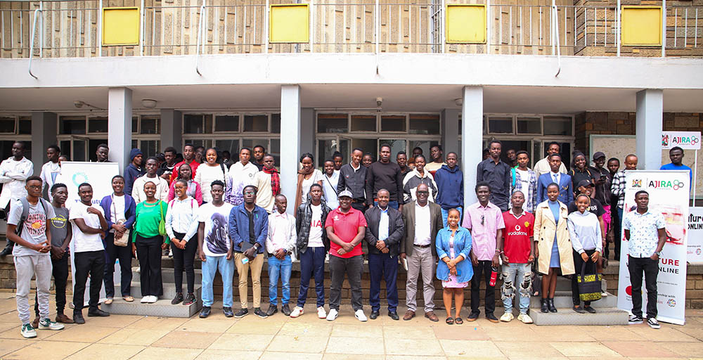 Ajira Digital traininees in a group picture with facilitators outside the Main Hall. Director, ICT Services Prof. Salesio Kiura together with Dr. Patrick Okanya from the Department of Biochemistry and Biotechnology made keynote remarks during the closing ceremony 