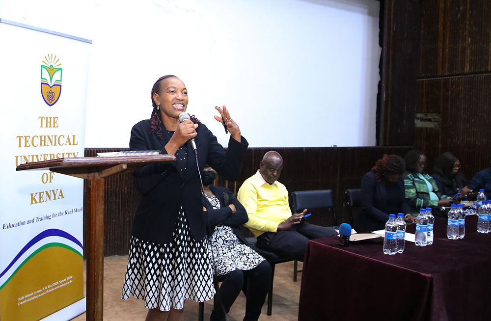 One of the guests, Agnes Mwangangi, Council Member representing Radio at the Kenya Editors' Guild speaking during the symposium at Lecture Theater.