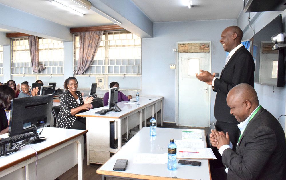 Prof. Isaac Orina speaking to members of staff who participated in the Research to commercialisation (R2C) TOT training at the university. Prof. Orina awarded them with certificates of participation.