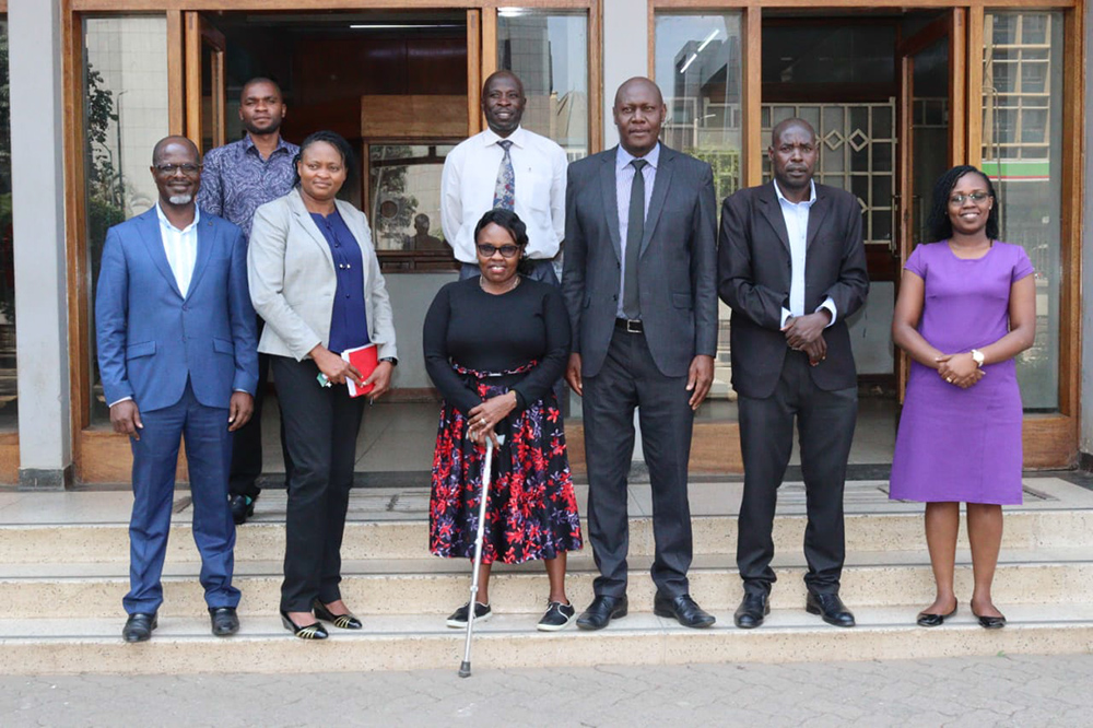 A team from Tangaza University and a member of NCPWD in a group picture with senior members of staff from the univeristy. They were received by DVC-RTD, Prof. Alfred Orina 