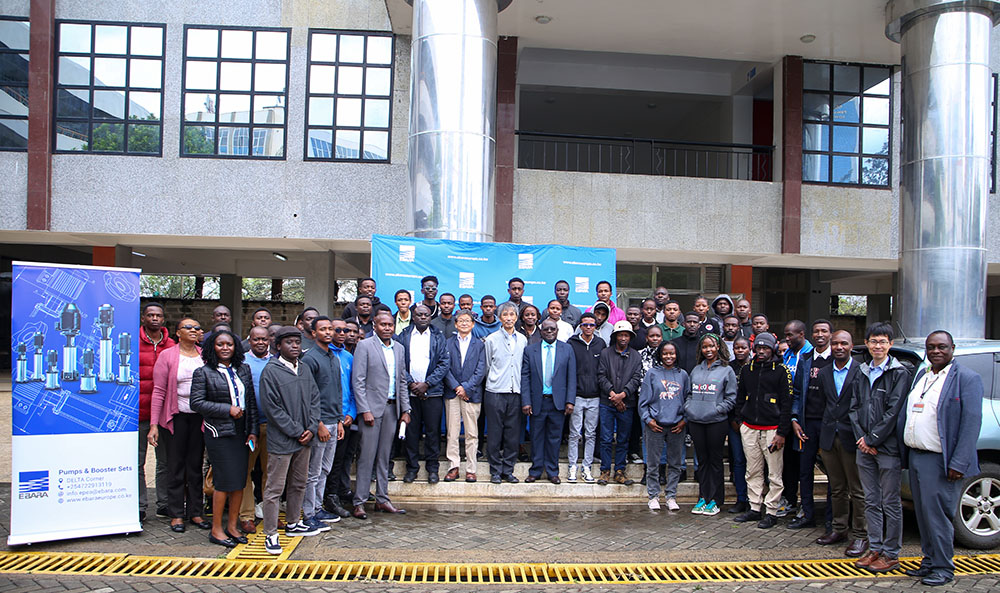 Experts form Ebara Corporation in a group picture with senior members of staff and students during the one-day pump technologies simulation and training