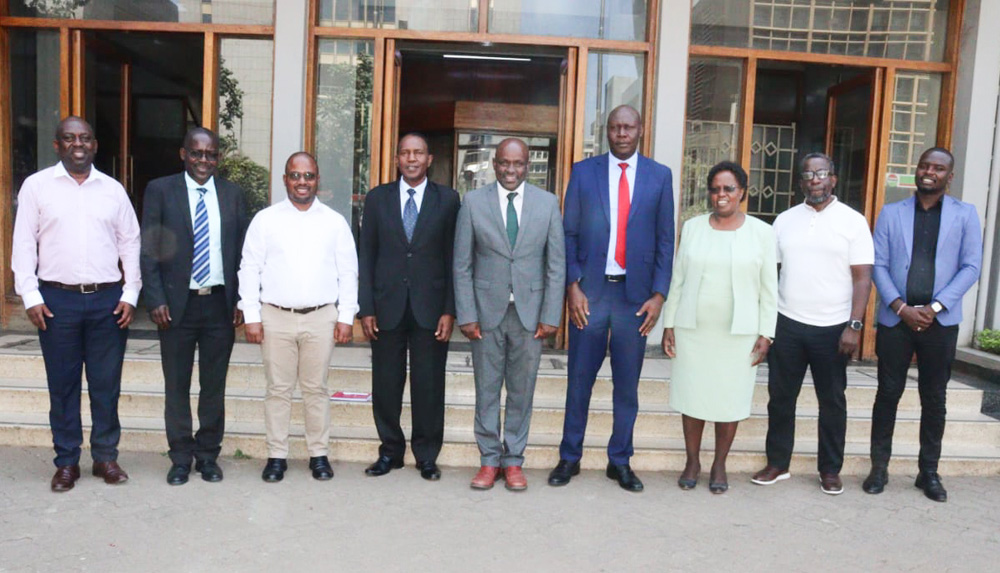 A delegation from KeNIA led by the CEO Dr. Tonny Omwansa, in a group picture with members of the University Management and other Senior Members of Staff after a consultative meeting held at the University