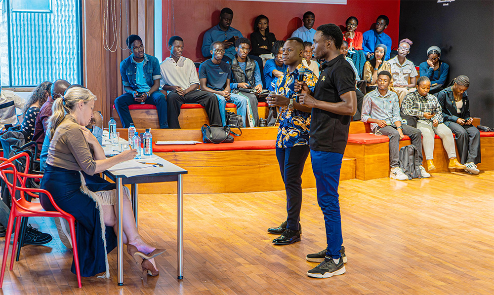 TU-K students Hopekings Musinya and Obren Lourmex making a presentation on 'How Artificial Intelligence is Reshaping Education' during the contest at Alliance Française