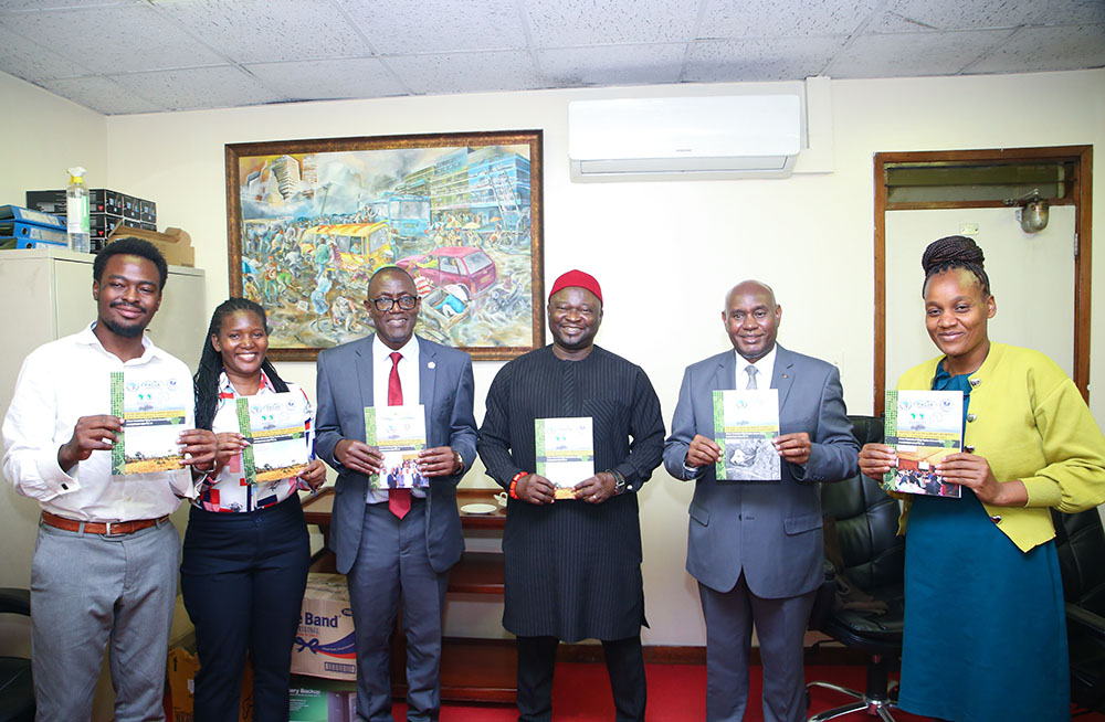 Executive Director, African Technology Policy Studies Network, Prof. Nicholas Ozor (3rd Right) when he called on the VC Prof. Benedict Mutua (2nd Right). Prof. Ozor also donated books to the University.